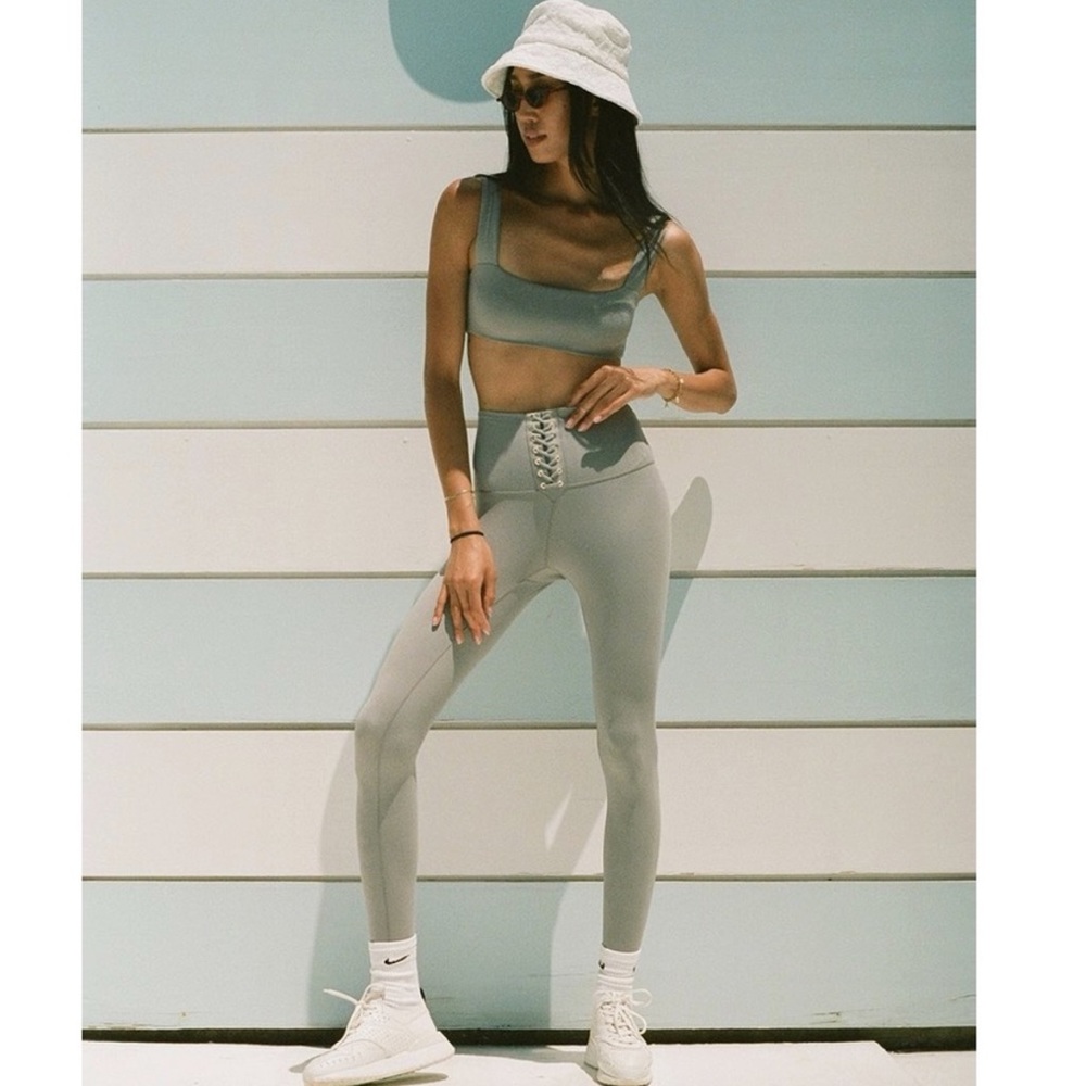 We wore what grey lace up leggings and sports bra set